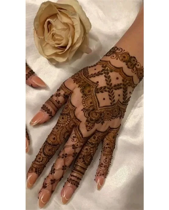 Twist And Loop Intricate Back Hand Mehndi Design Formation Twist And Loop Intricate Back Hand Mehndi Design Formation